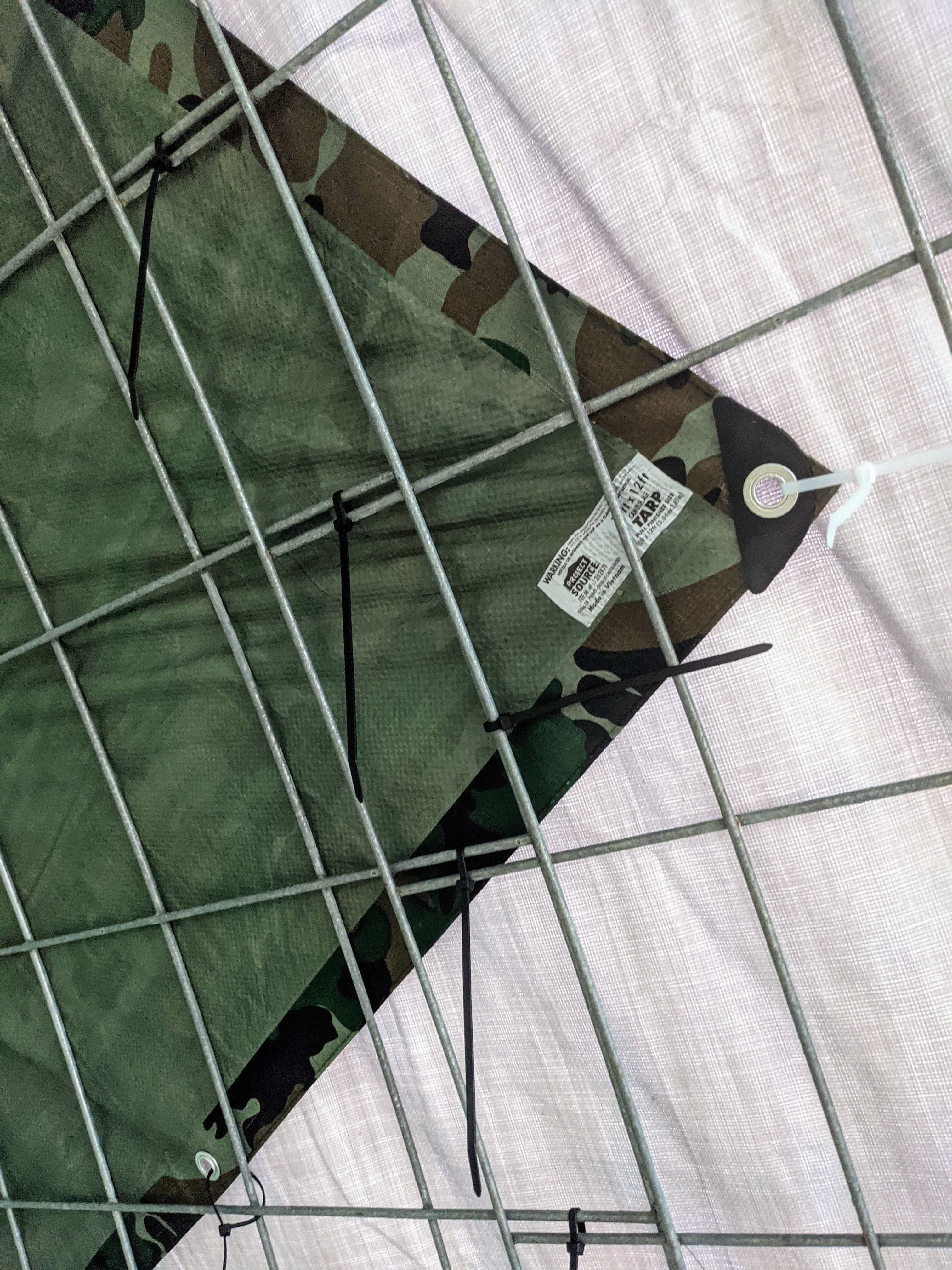 Rear tarp tucked under the roof tarp and secured with zip ties.