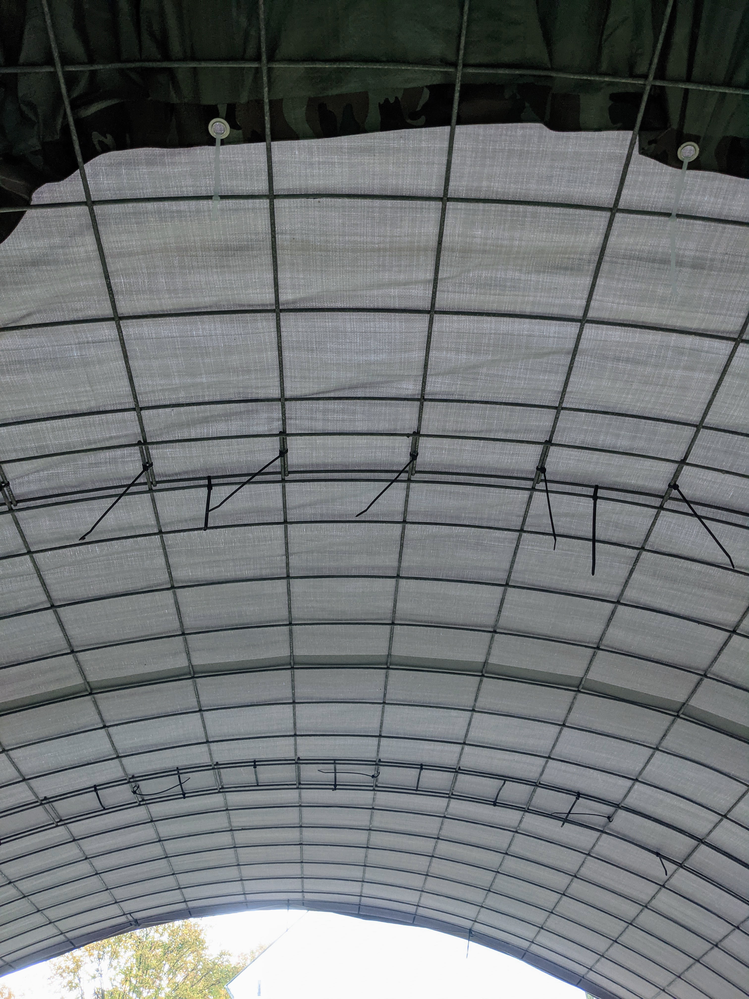 DIY horse shelter roof with cattle panels and tarp