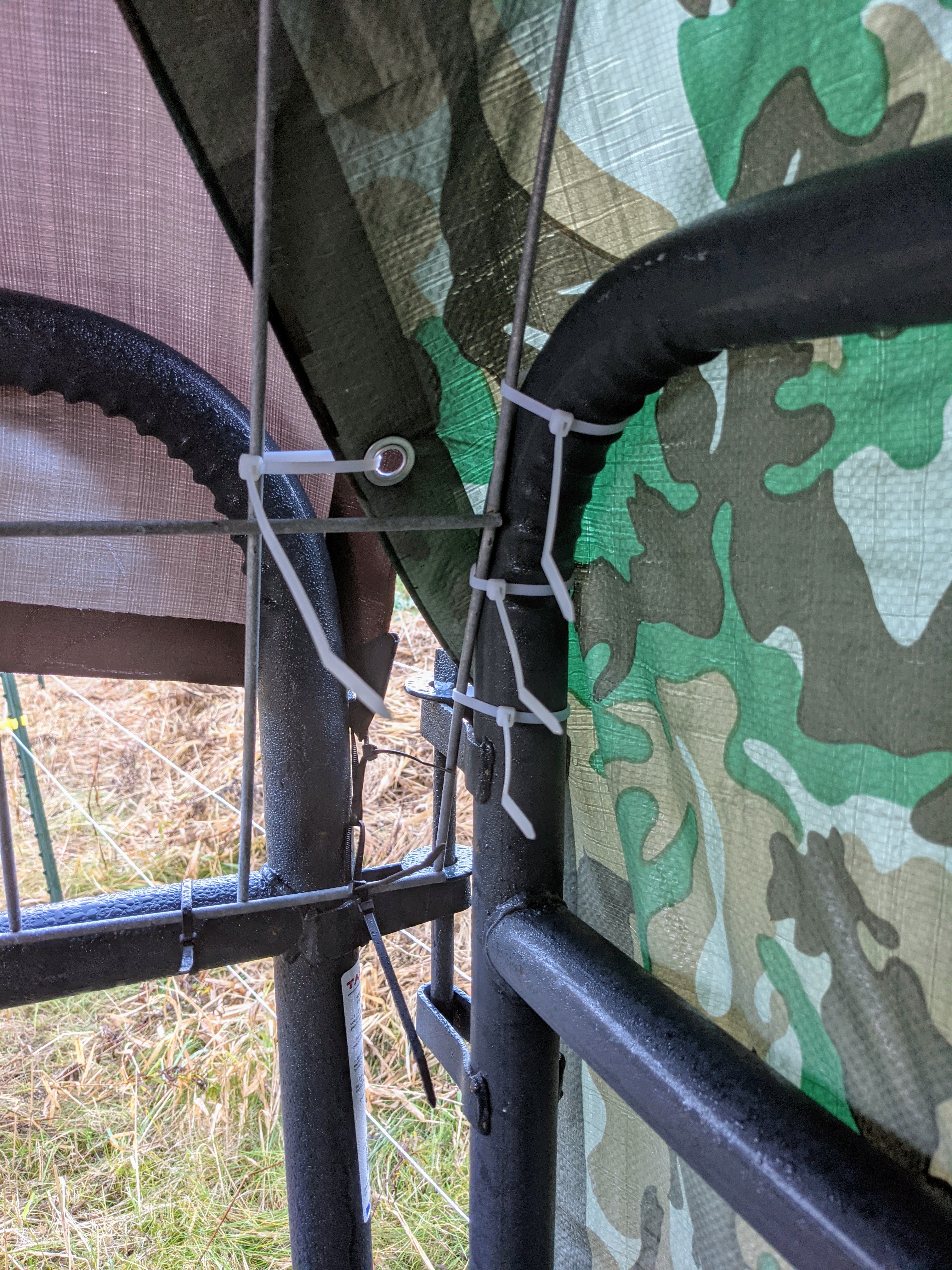 Tarps tied securely in place